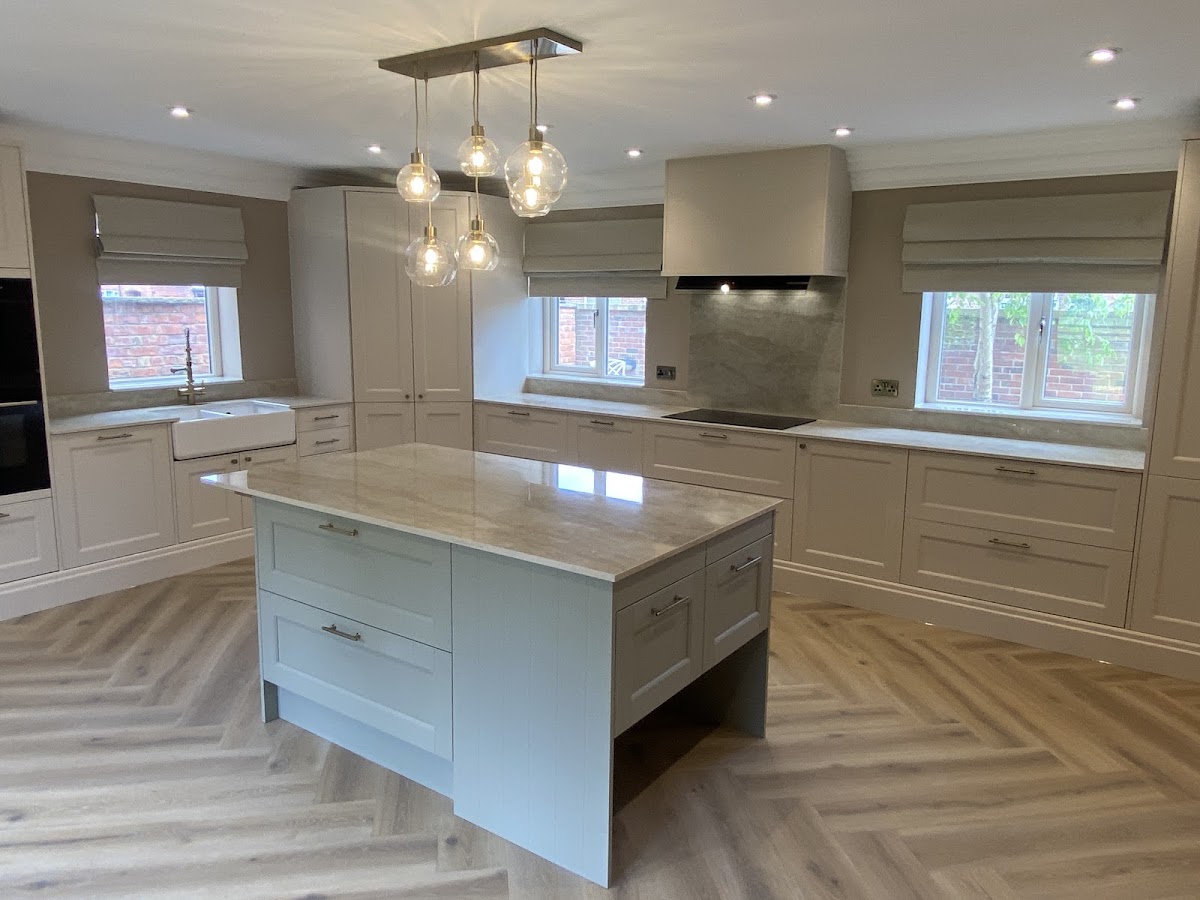 Bespoke cream shaker kitchen with island and herringbone floor by BB Joinery