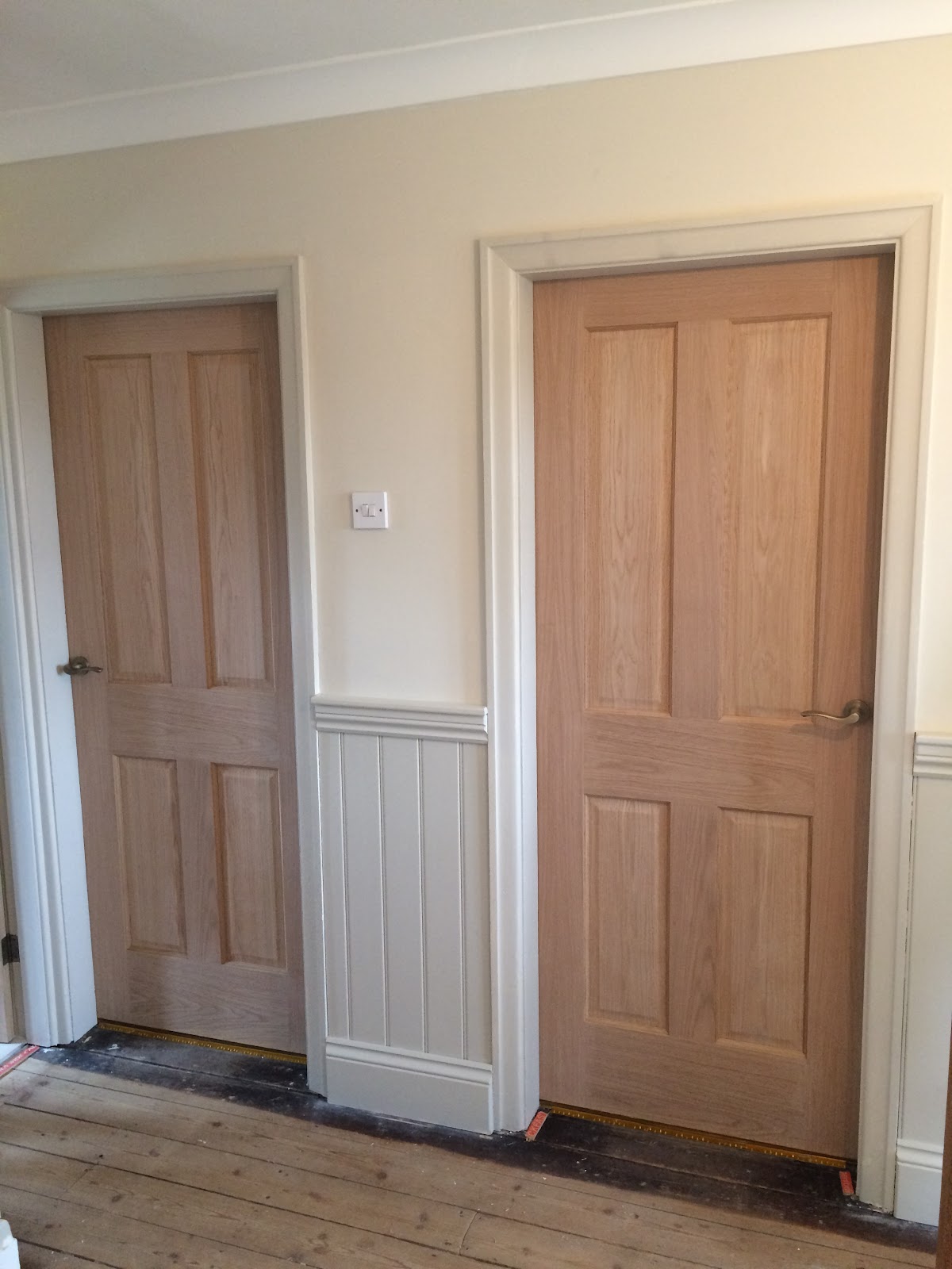 Solid oak internal doors and wainscot panelling fitted by BB Joinery